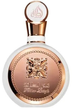 Flacon Fakhar Rose Lattafa arrondi aux reflets or rose