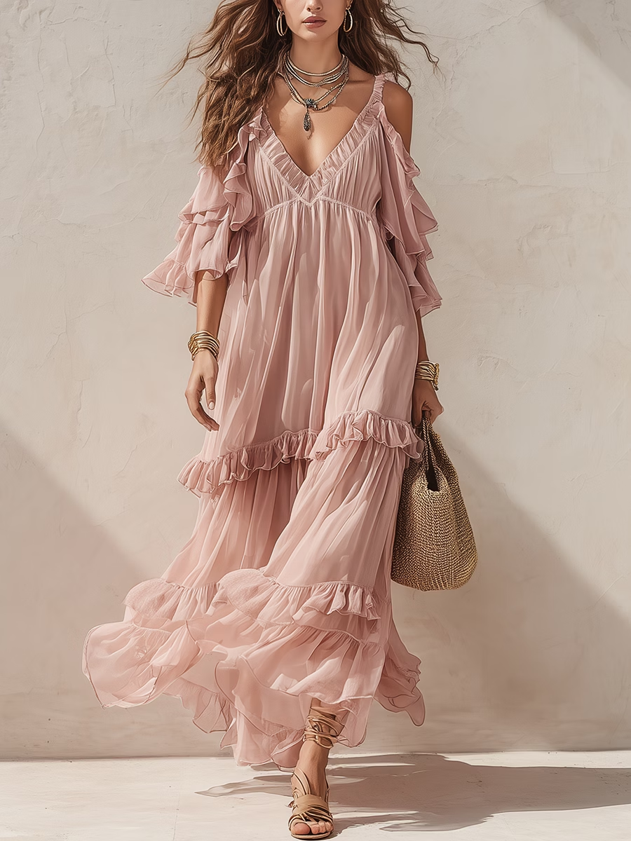 Photo de référence de la robe longue rose poudré à fines bretelles, épaules dégagées et volants
