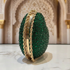 Sac de soirée vert émeraude et doré dans un décor oriental